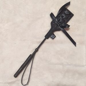 Elegant Black Leather Riding Crop